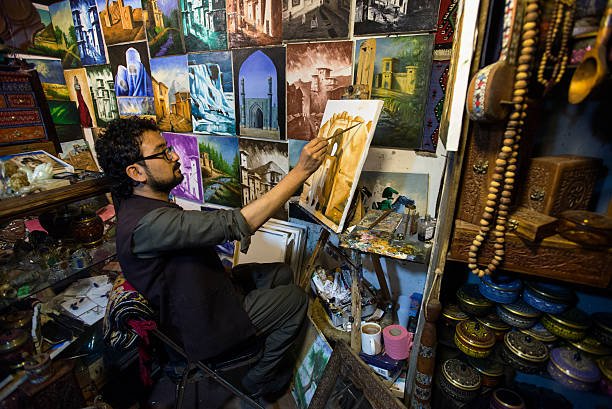 Painting workshop on Chicken street, famous by its workshops of traditional Afghan arts, Kabul, Afghanistan (Photo by NurPhoto/NurPhoto via Getty Images)